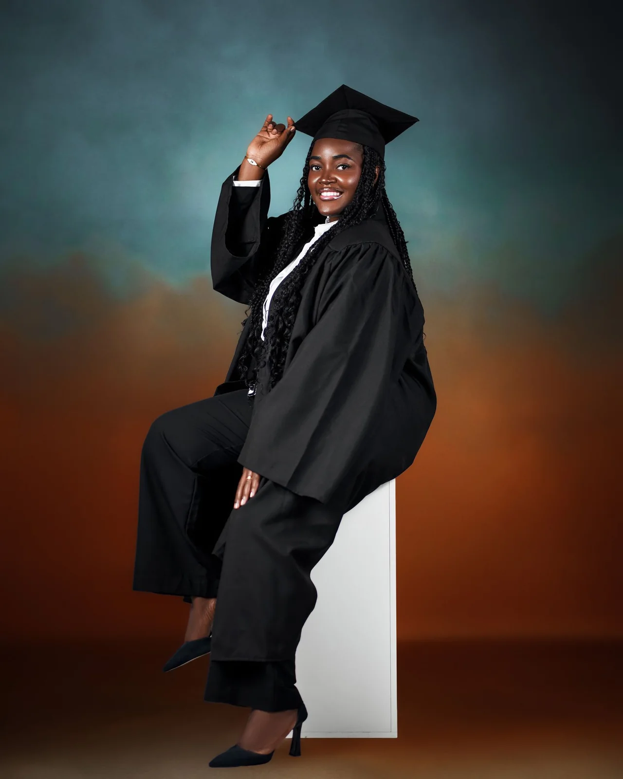 Black graduate celebrating an academic milestone